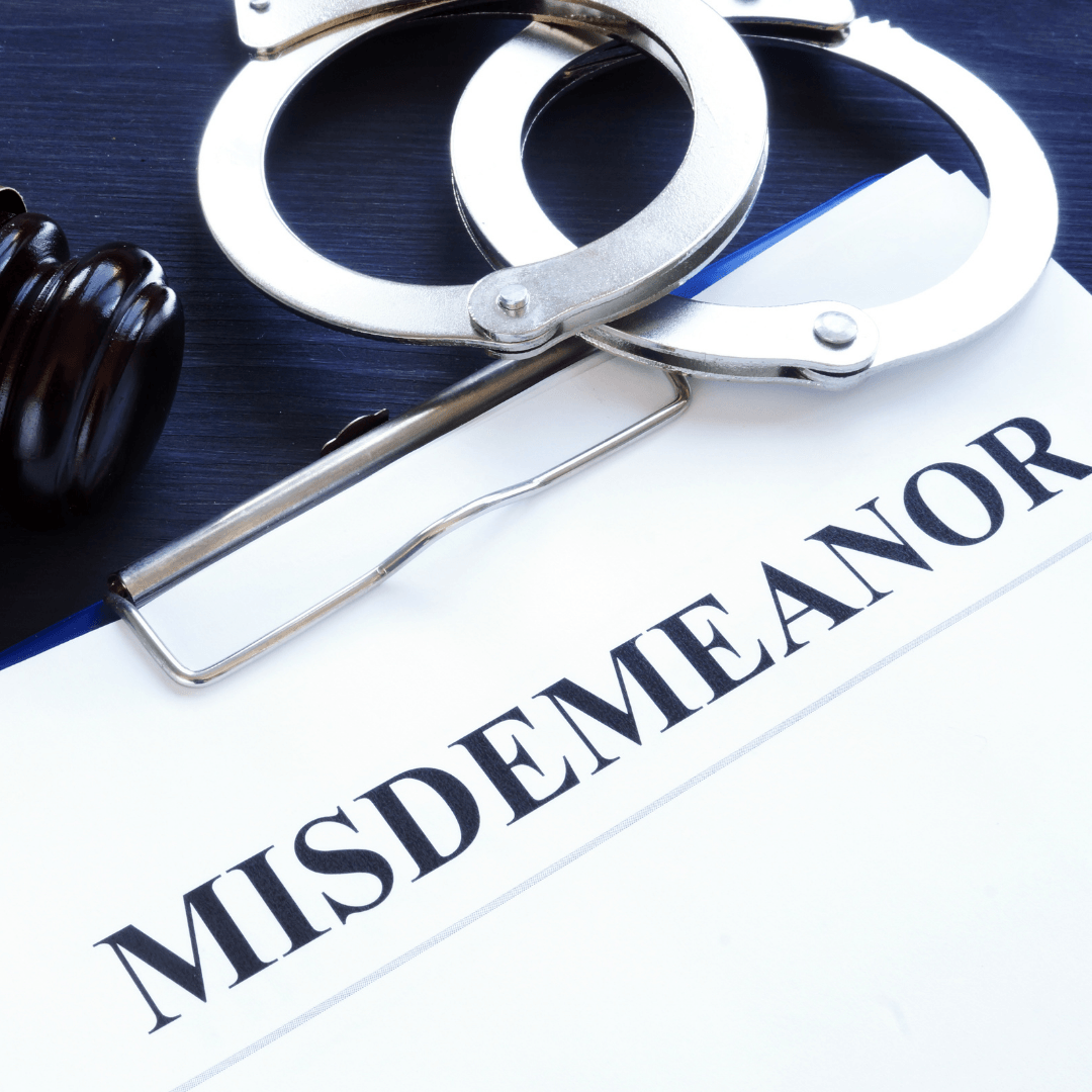A clipboard with misdemeanor word written on it