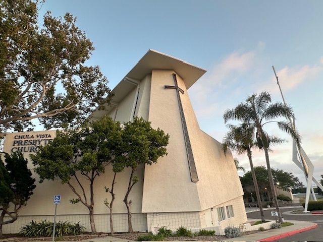 A church with a cross on the side of it
