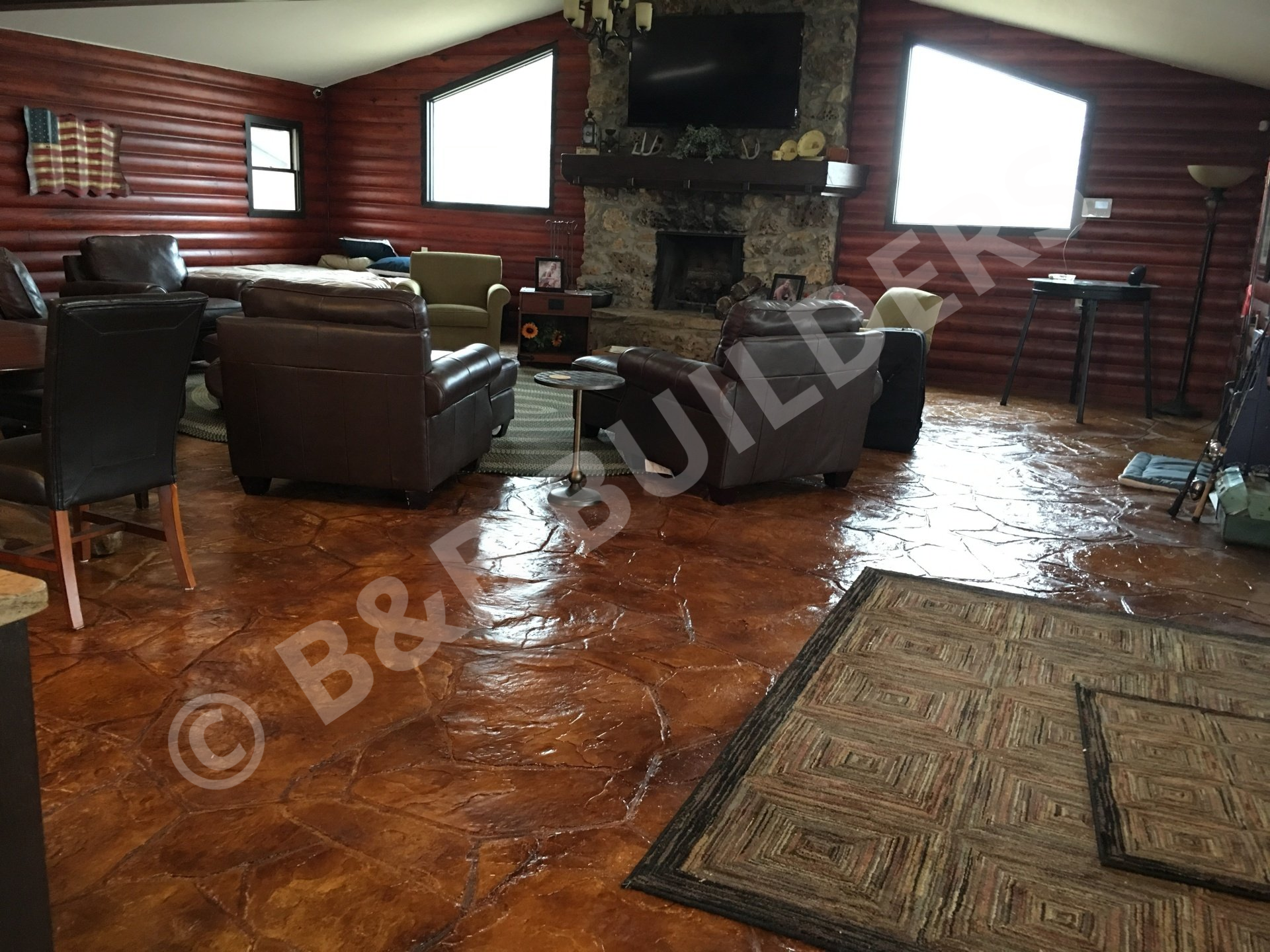A  stamped concrete interior floor with high shine and leather-like color