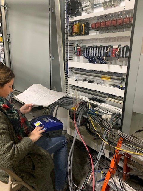 Contractors  — Woman Checking The Connection in Frankfort, KY