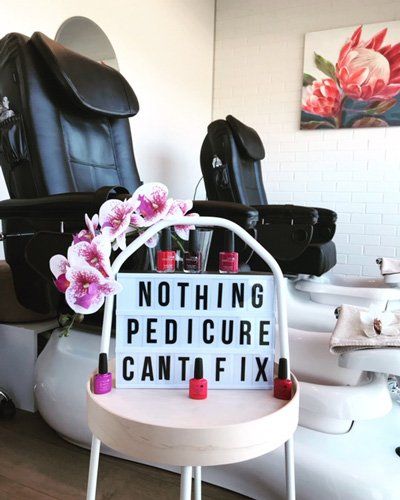 A sign that says Nothing a Pedicure Can't Fix