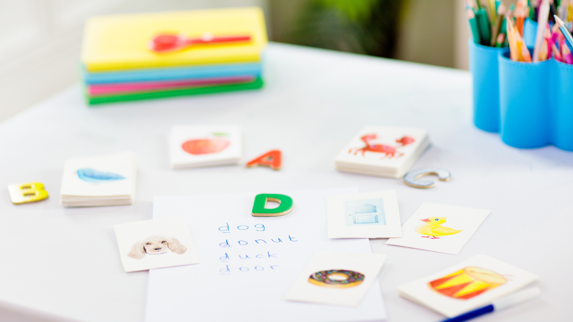 A table with a bunch of cards and letters on it.