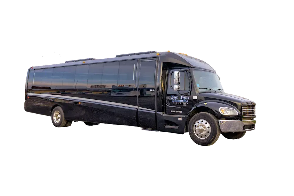 A white bus with tinted windows, the words 