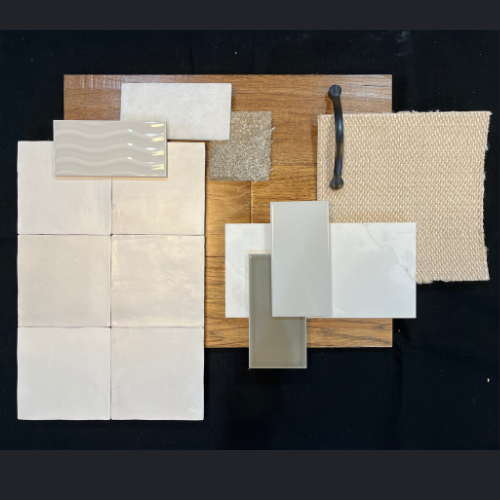 A wooden board with various tiles and fabrics on it