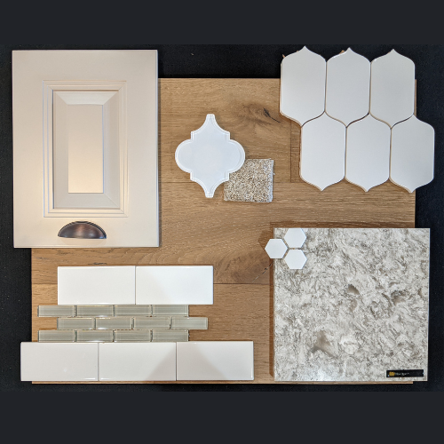 A wooden board with a variety of tiles , cabinets , and counter tops.