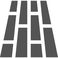 A gray icon of a road with a white line between the blocks.