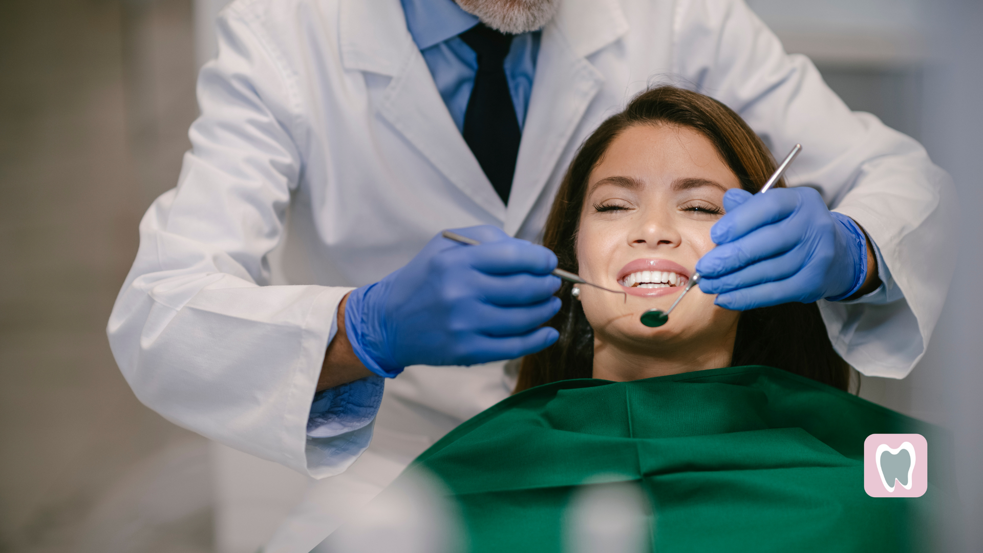 A dentist is examining a woman 's teeth in a dental office.