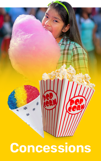 A girl is eating cotton candy next to a box of popcorn.