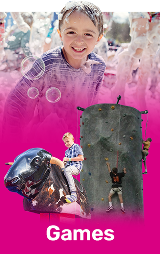 A boy is riding a bull on a pink background.