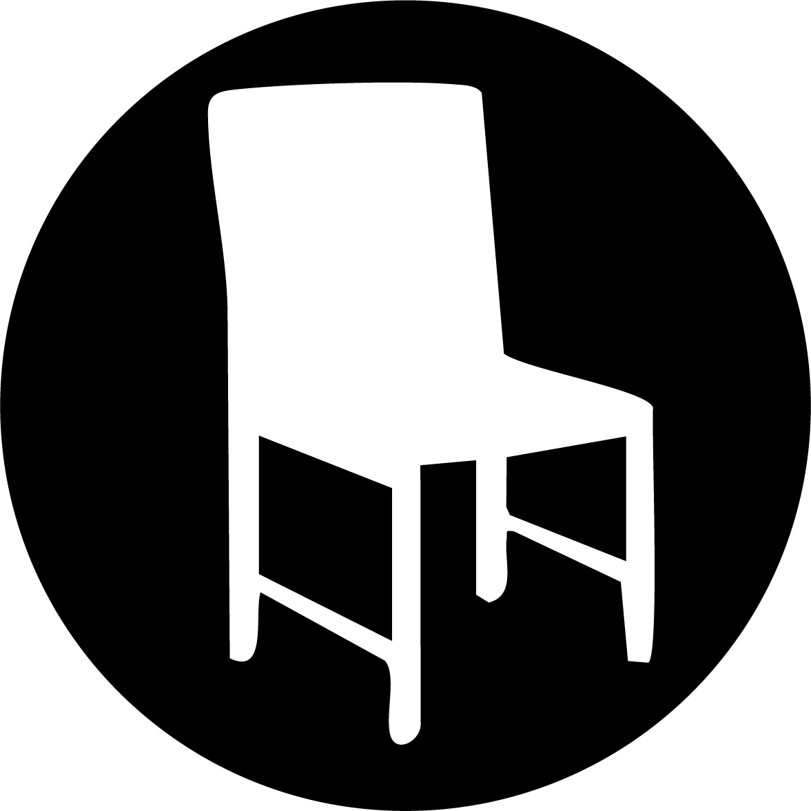 A black folding chair is sitting on a white surface.