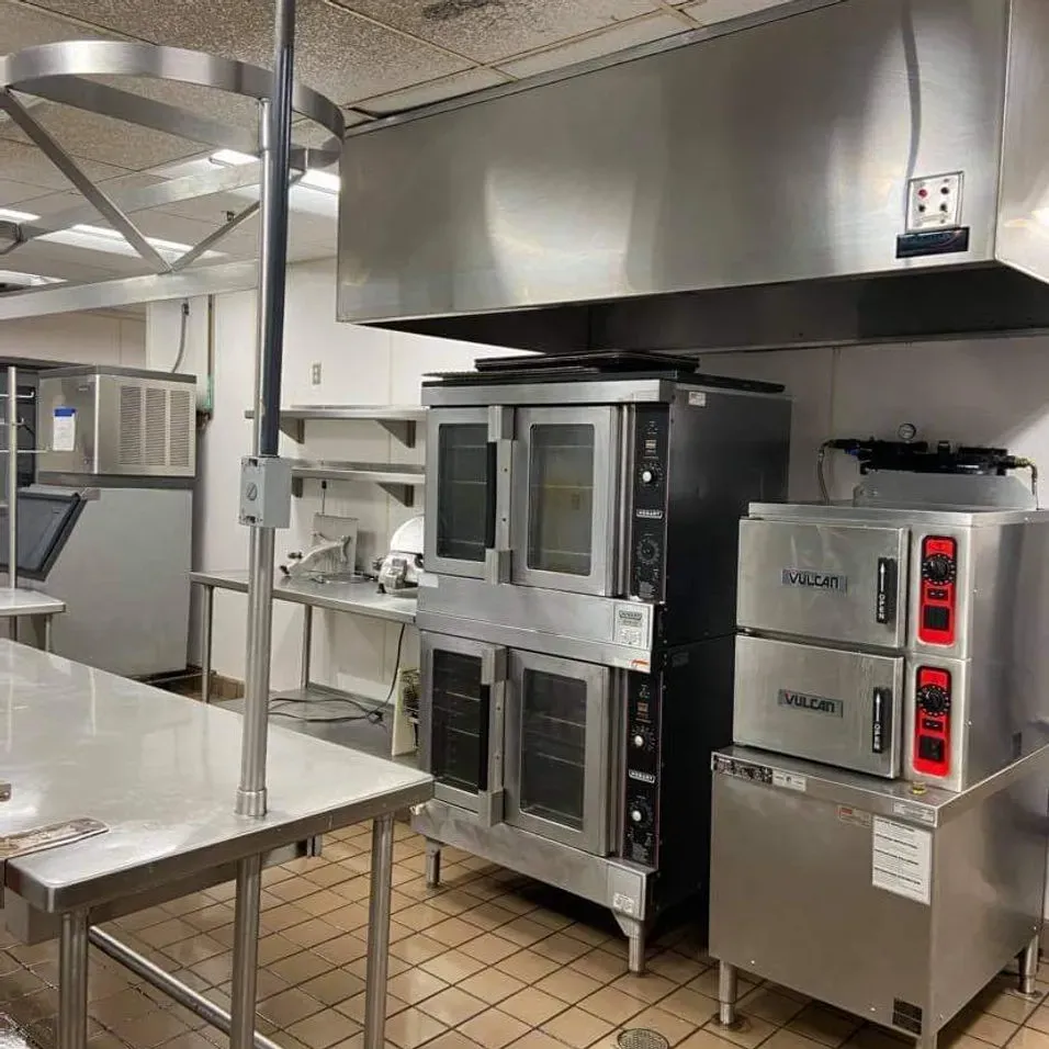 A kitchen with a lot of stainless steel appliances