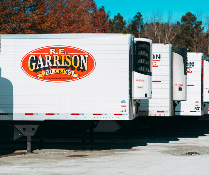 Rows of R.E. Garrison truck trailers