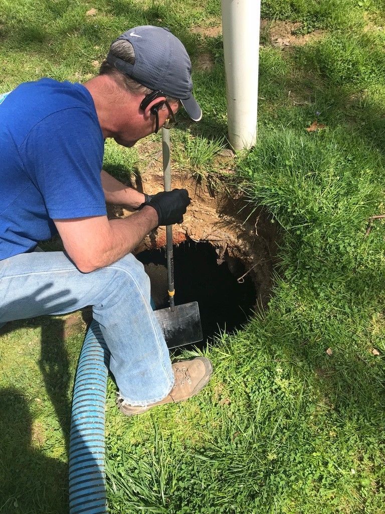 Digging to Expose Septic Tank Lid — Chester County, PA — J. Gallagher Septic & Wastewater Control