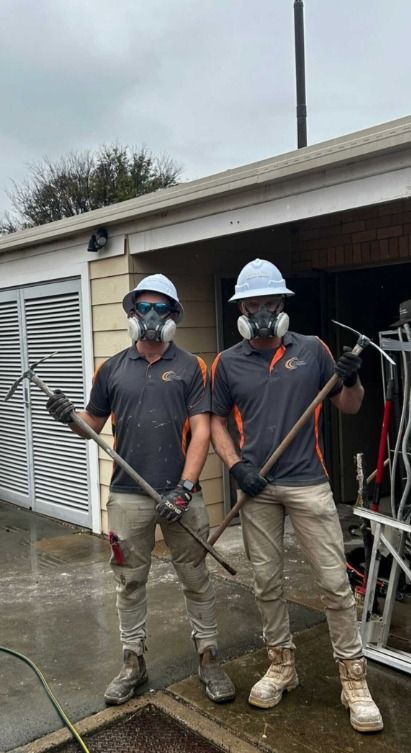 Two Men Wearing Hard Hats And Masks — Chandolin Construction In Robin Hill, NSW