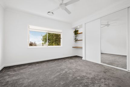 Newly Built Bedroom with Plush Grey Carpet - Chandolin Construction in Robin Hill NSW