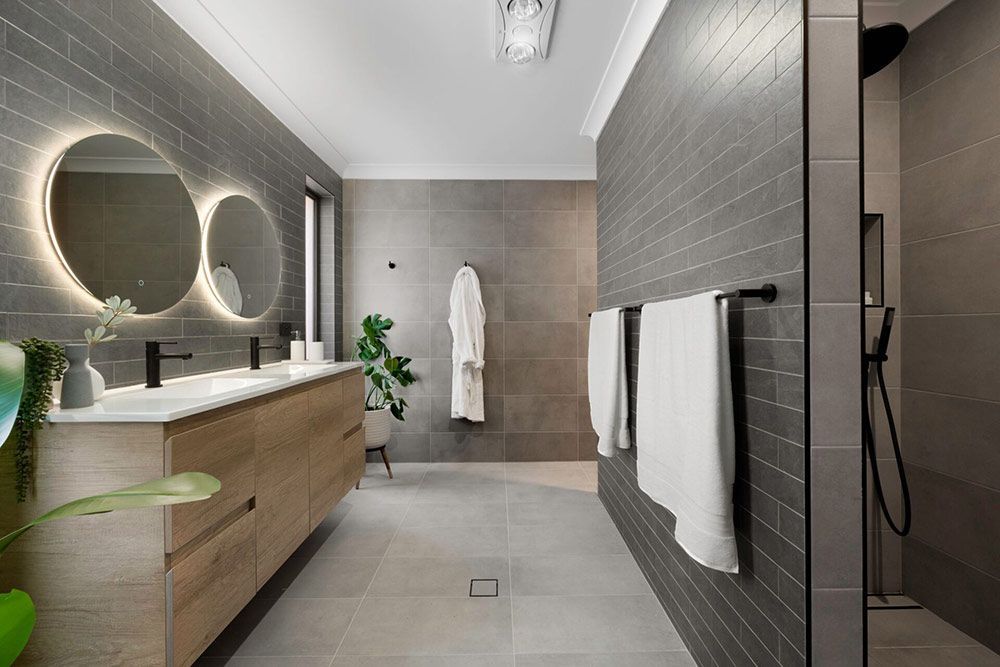 A Bathroom With Two Sinks — Chandolin Construction In Robin Hill, NSW