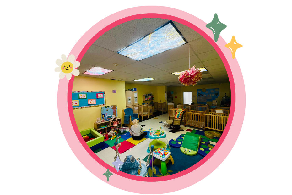 A colorful child care room with toys, cots, and a caregiver.
