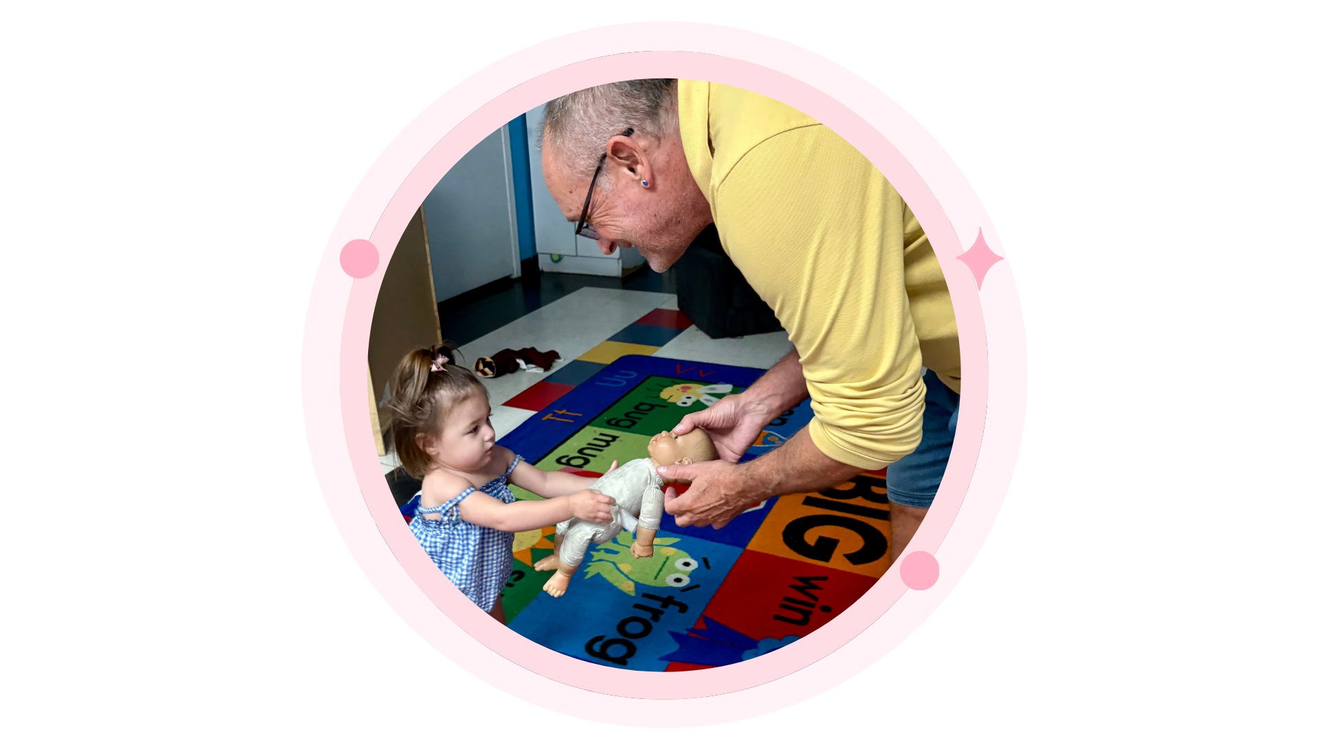 Children and a teacher decorating cookies at a table in a classroom.