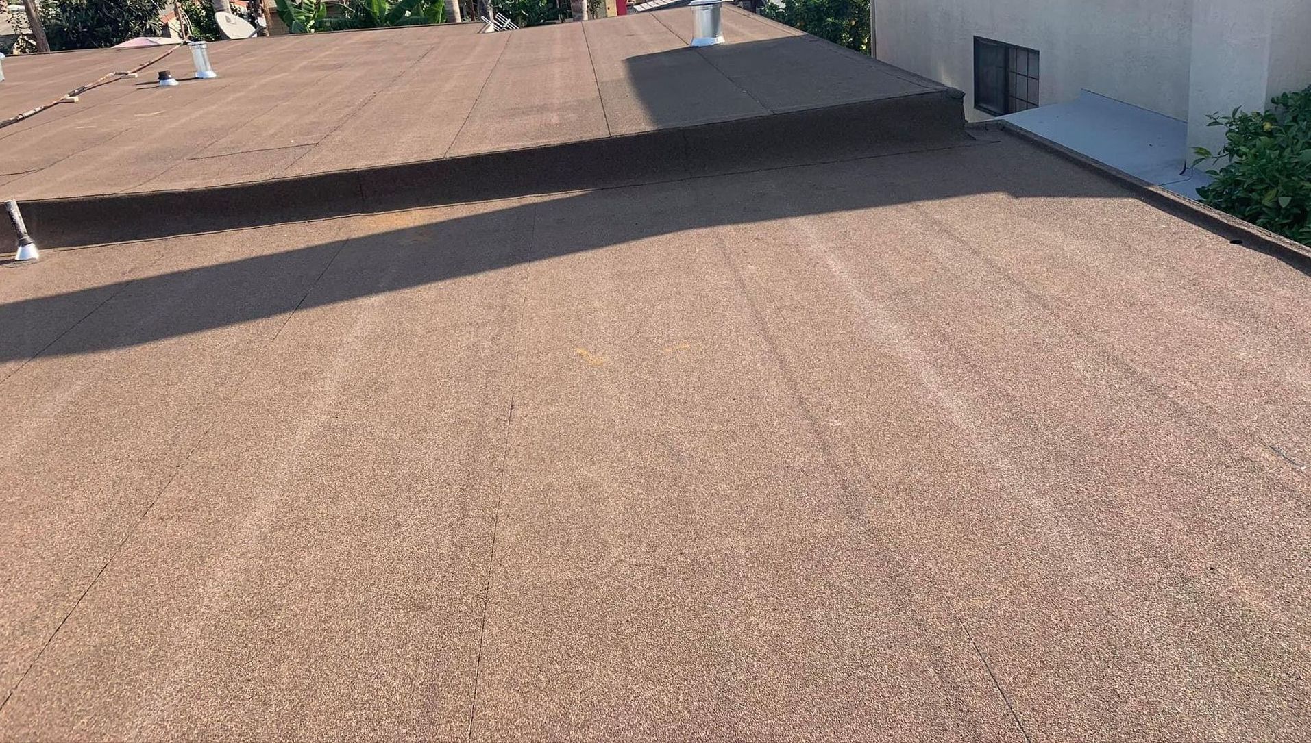 flat roofing application on commercial rooftop