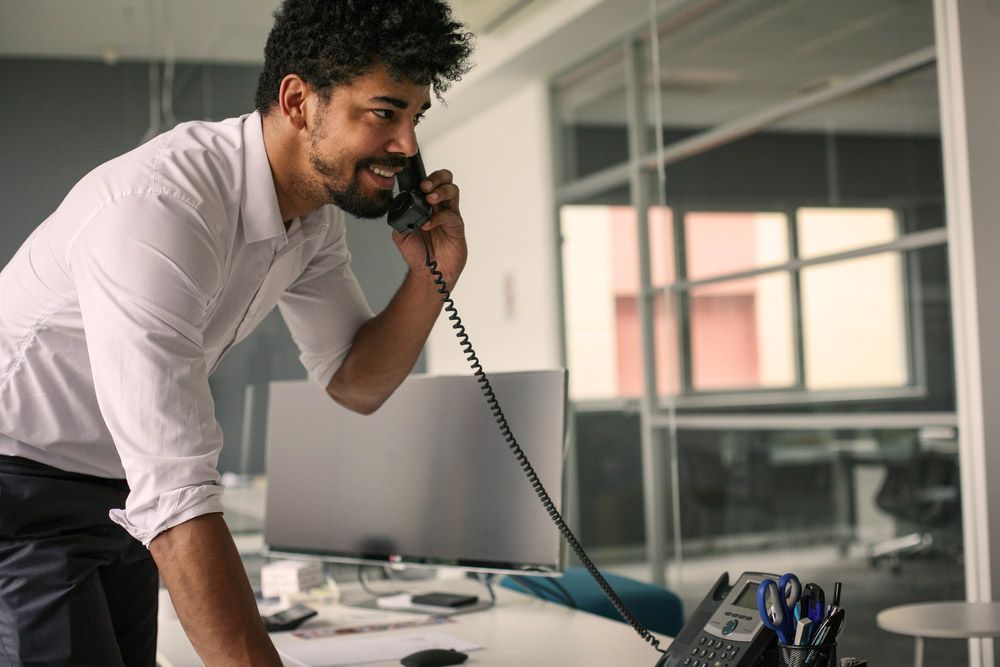 Man Having a Conversation on a Telephone — Communication Systems in Hunter Valley, NSW