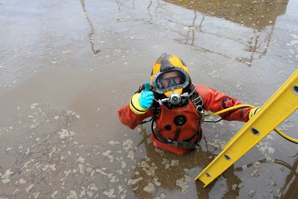 diver in dirty water