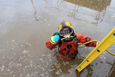 diver in dirty water