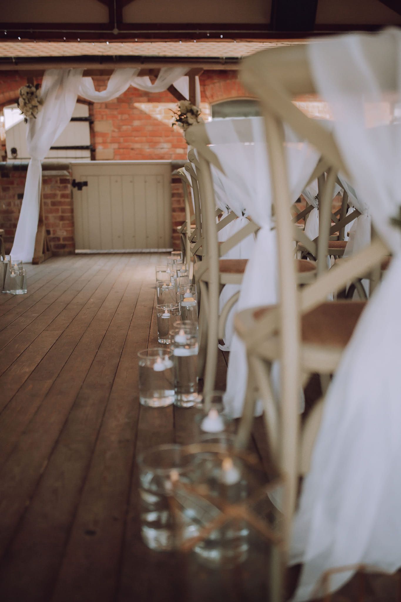 rustic ceremony decor, candle lit, wedding aisle