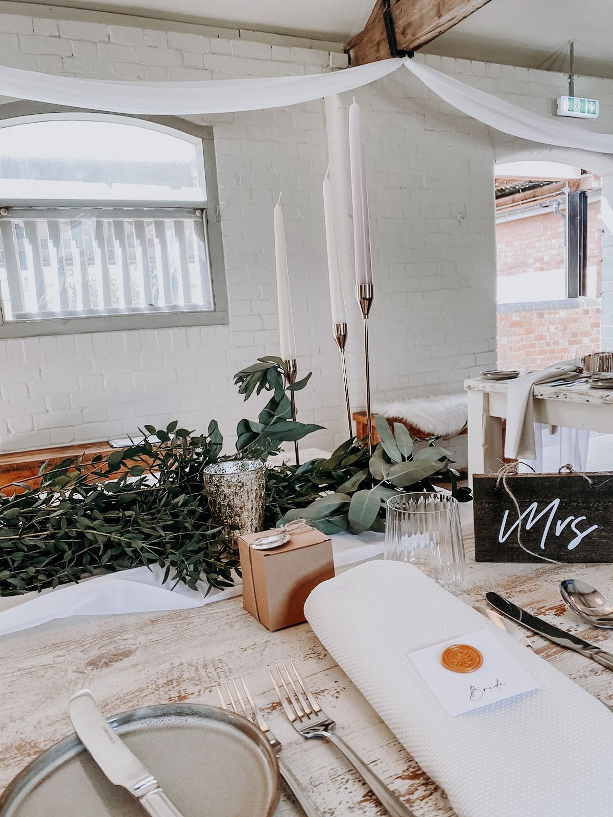 Relaxed wedding decor in neutral tones at The Hall Barns