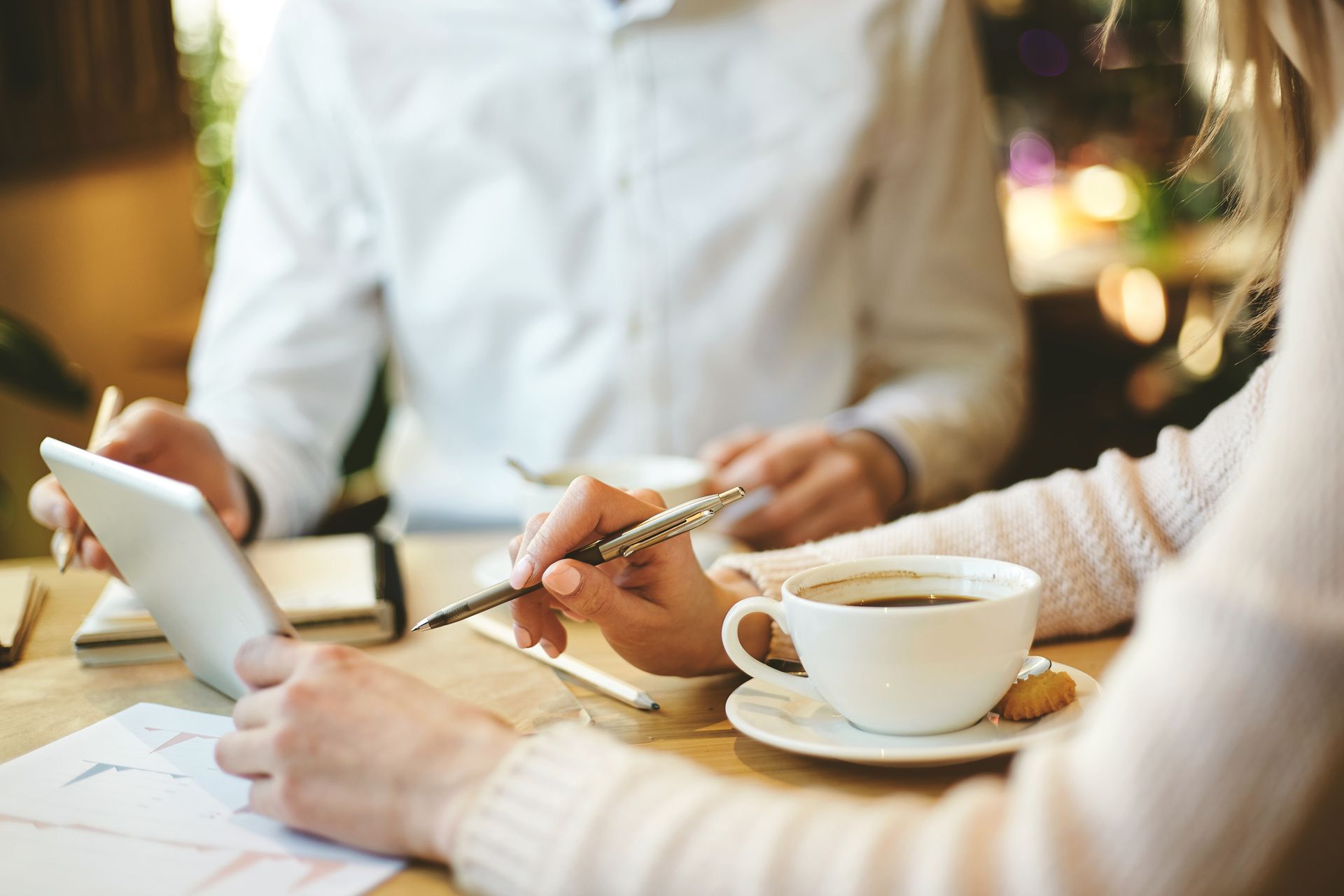 Home seller negotiates offer over coffee