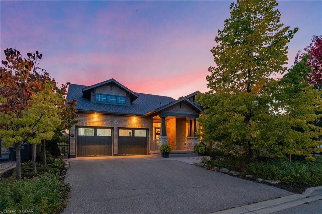 A large house with a lot of trees in front of it