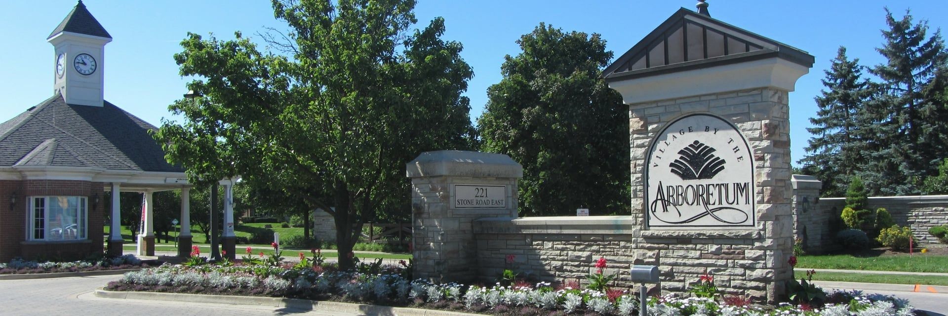 A stone sign that says ' agricultural ' on it
