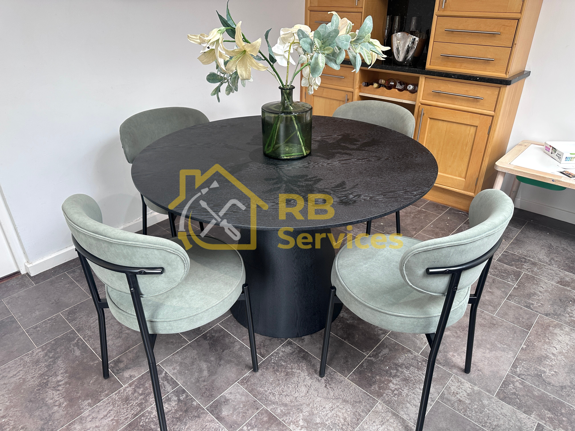 Black dining table and chairs from Dusk