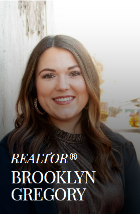 Realtor Brooklyn Gregory smiling; outdoor portrait.