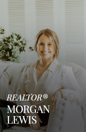 Woman smiling, seated on a cream-colored couch, labeled 