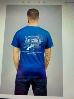 A person wearing a blue t-shirt with 