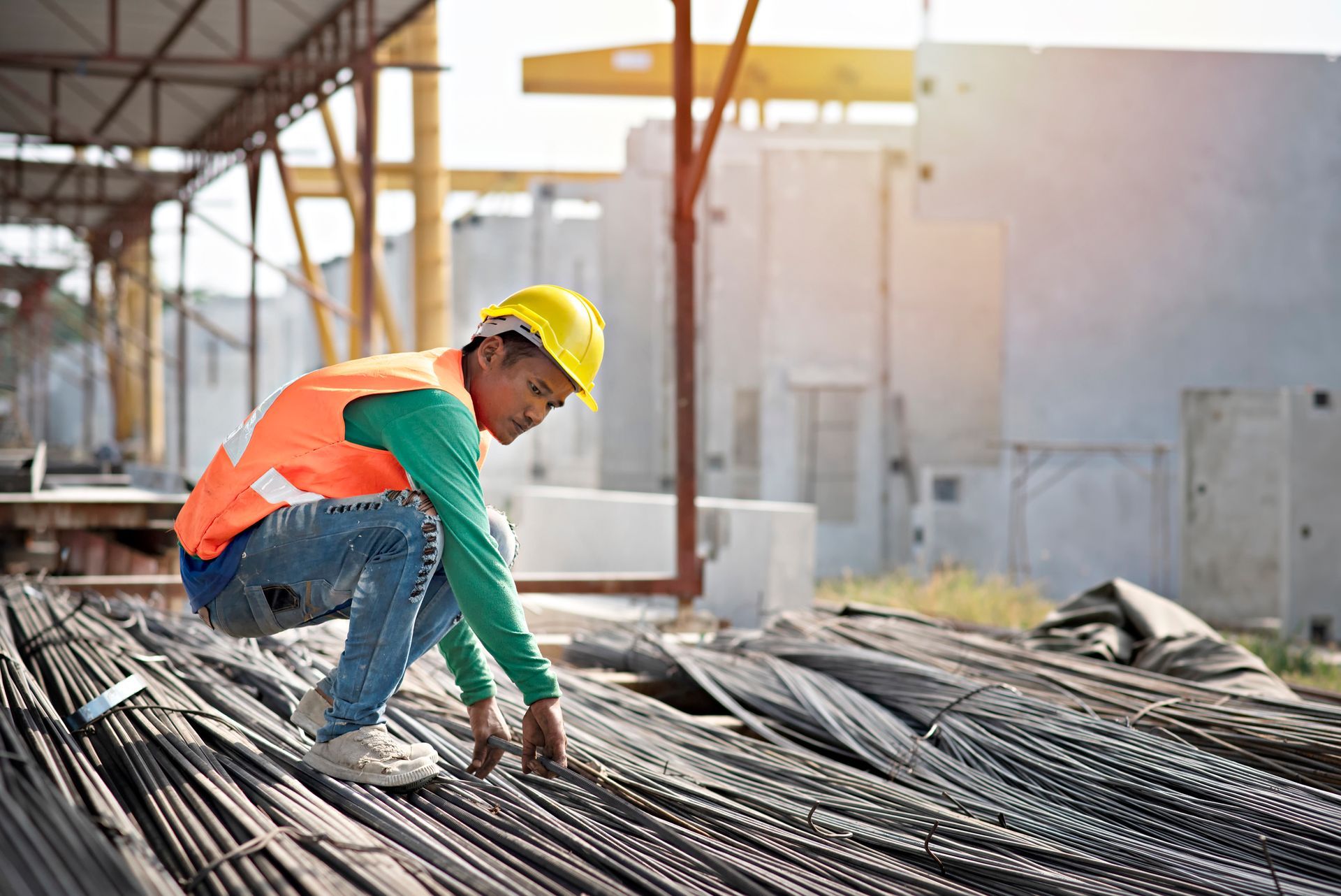 A construction worker is working at construction site.