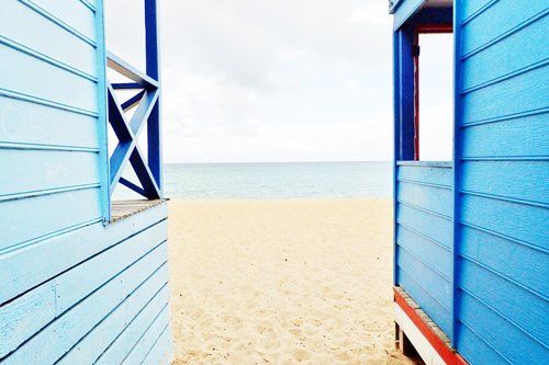 view of beach between buildings