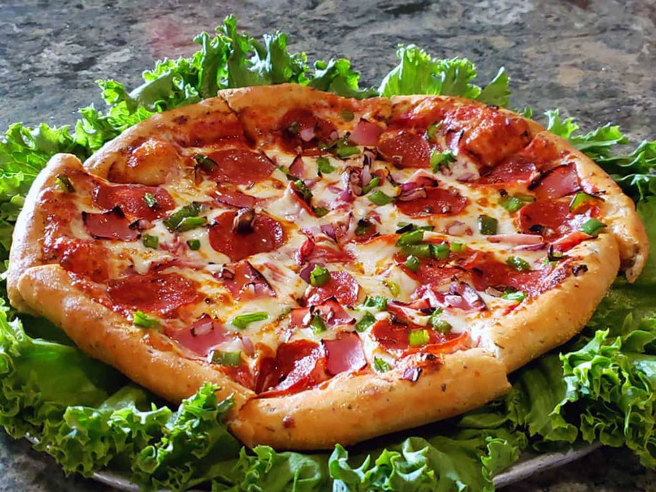 Pizza With Lettuce On Steel Tray