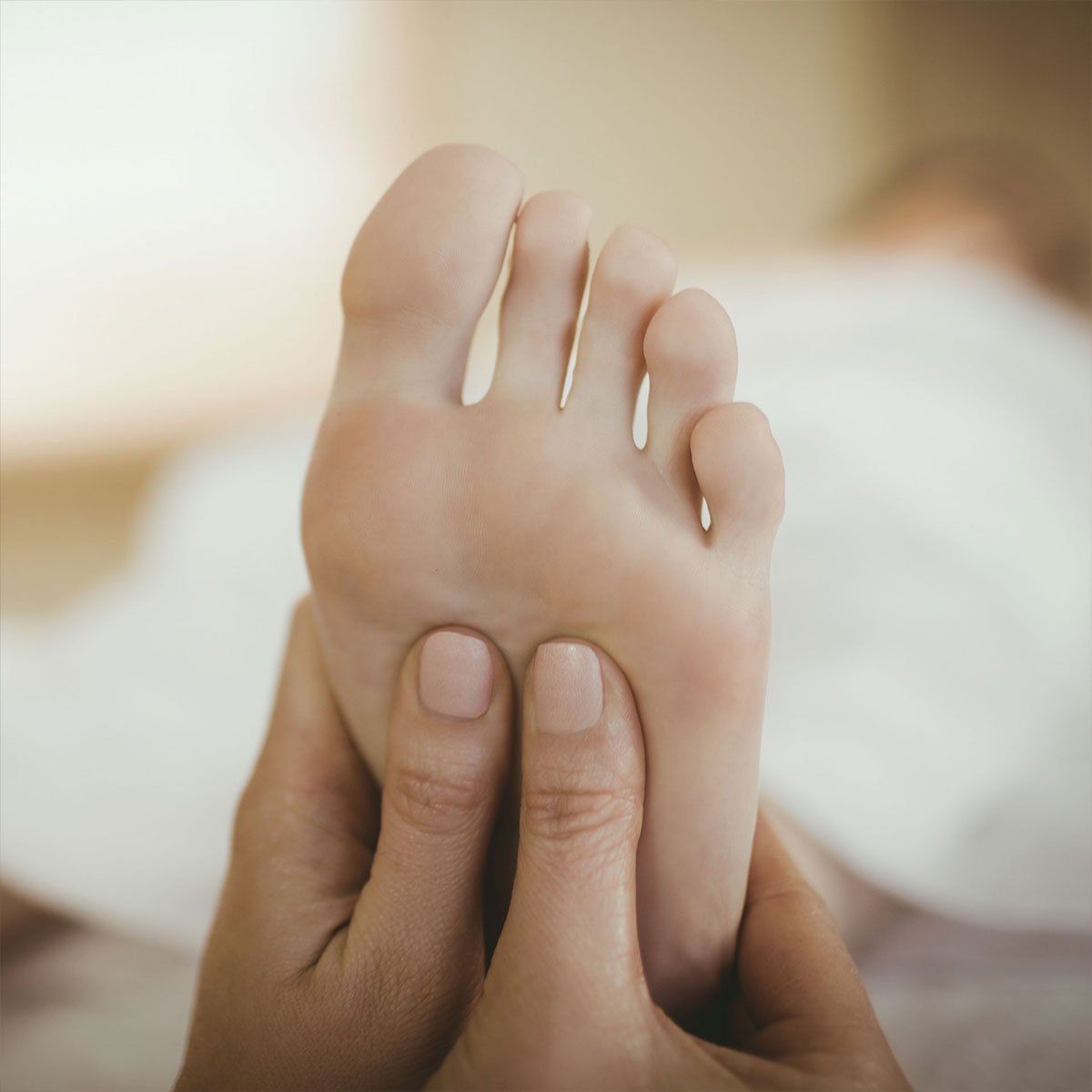 Practitioner performing Reflexology body work therapy treatment at Health Energies Vaughan Wellness centre