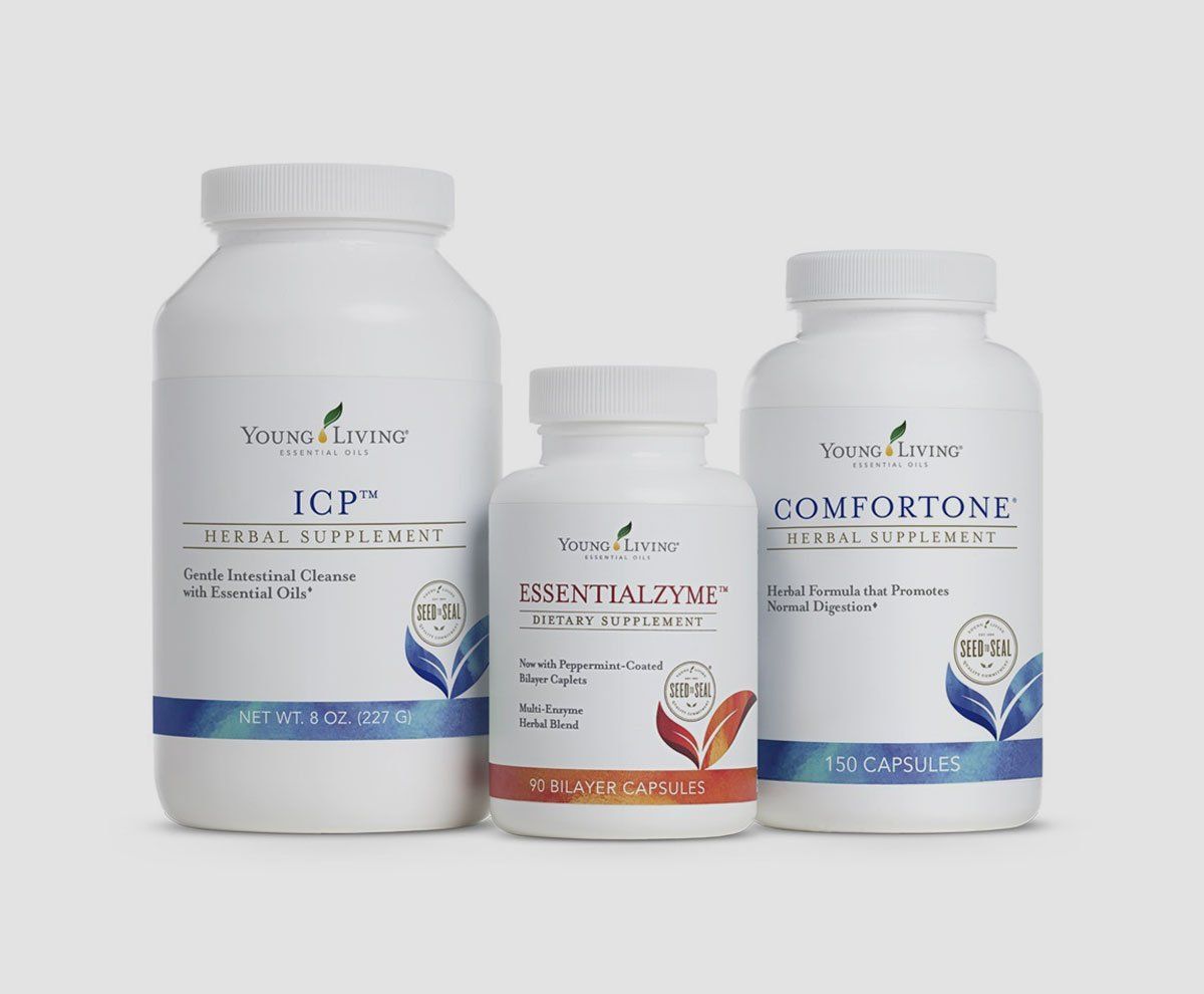 Three bottles of young living products are sitting next to each other