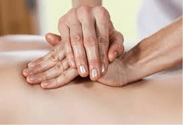 Practitioner performing a Reflexology treatment at Health Energies Vaughan Wellness centre