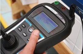 Person Pressing A Button On A Black Handheld Electrical Testing Device — Stellar Test and Tag in Gunnedah, NSW