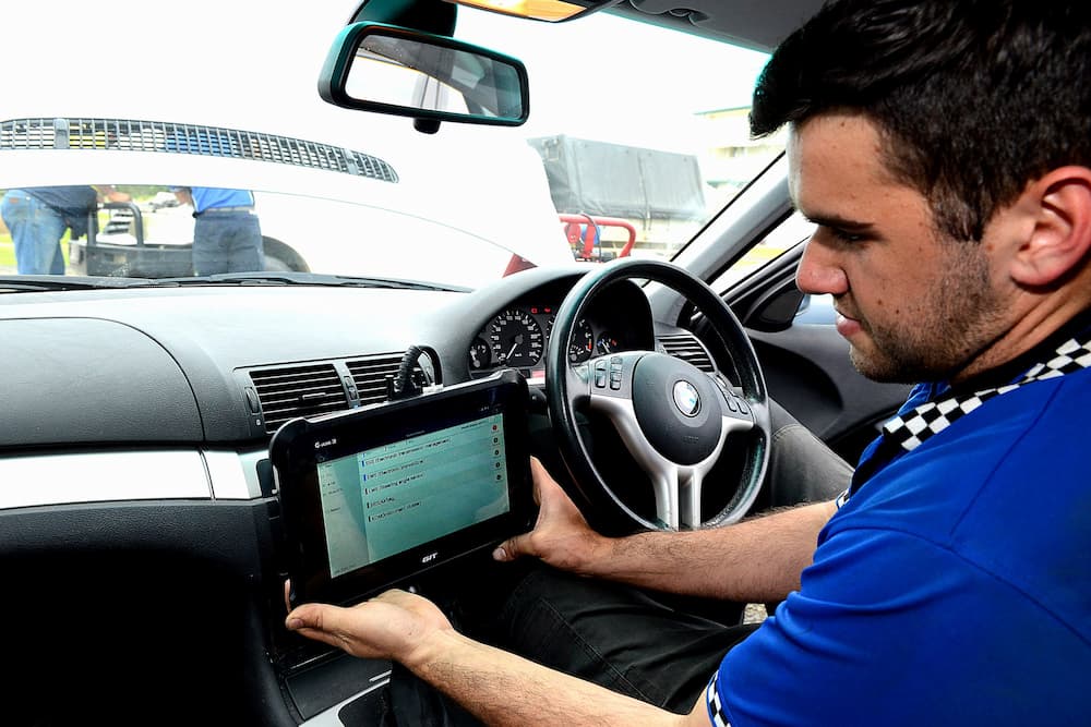 Mechanic Conducting Roadworthy Inspection — Advanced Auto Electrics & Mechanical in Innisfail, QLD