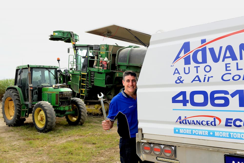 Man Holding a Wrench — Advanced Auto Electrics & Mechanical in Innisfail, QLD