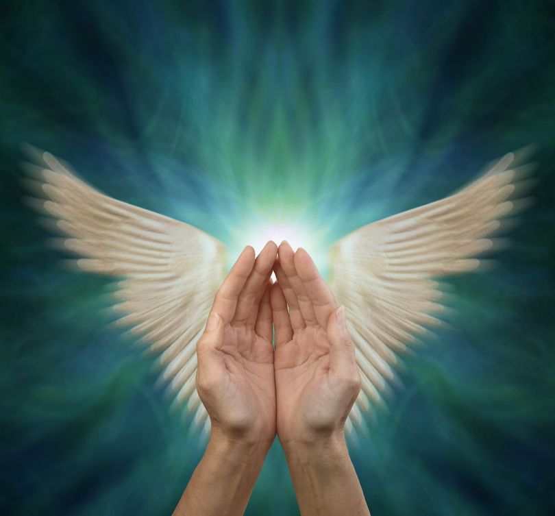 A Person is Holding Up Their Hands With Angel Wings Coming Out of Them — Angel of Light Nick Turner In East Lismore, NSW