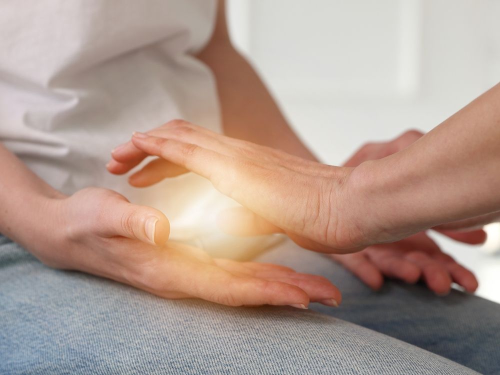 A Person is Holding a Light in Their Hands — Angel of Light Nick Turner In East Lismore, NSW