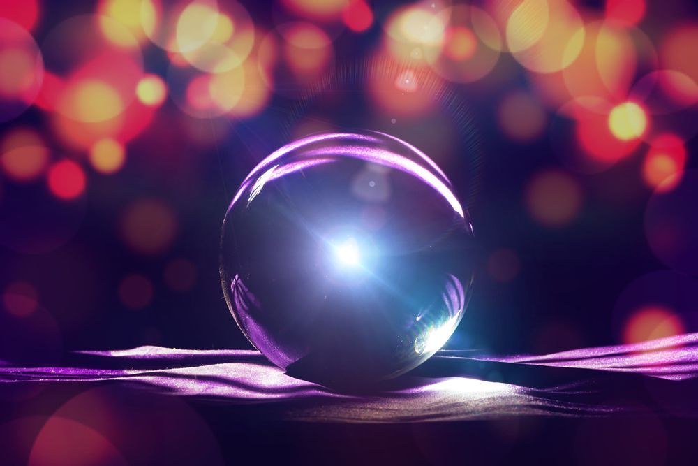 A Glass Ball With a Light Inside of It is Sitting on a Table — Angel of Light Nick Turner In Tweed Heads, NSW