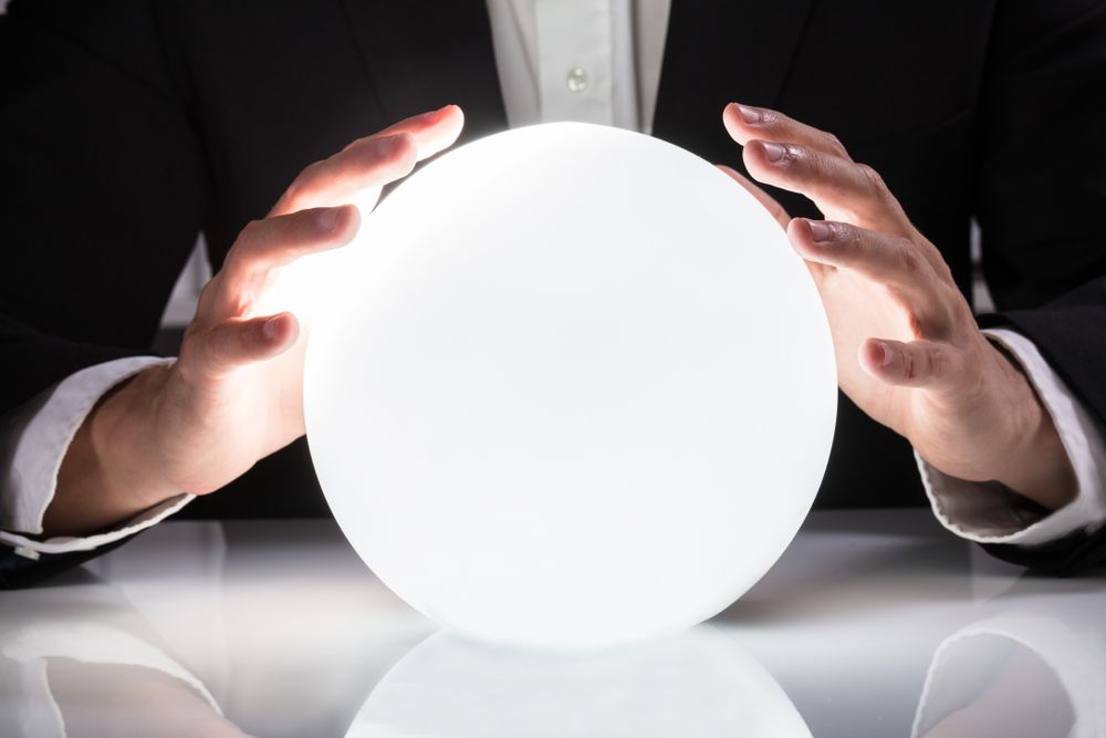 A Man in a Suit is Holding a White Ball in His Hands — Angel of Light Nick Turner In Tweed Heads, NSW