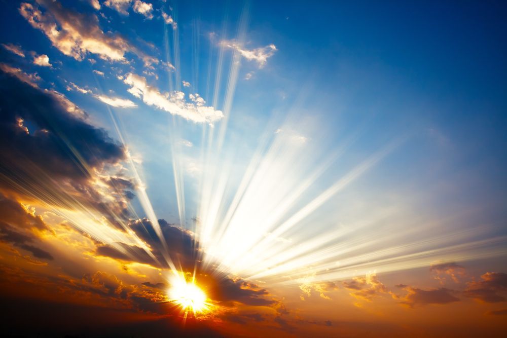 The Sun is Shining Through the Clouds at Sunset — Angel of Light Nick Turner In East Lismore, NSW