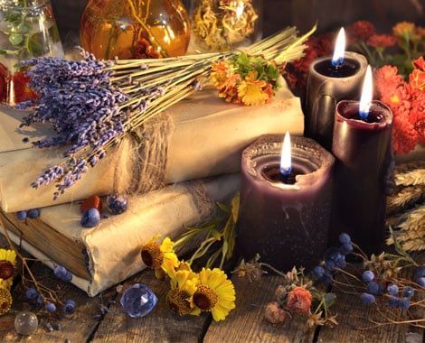 There Are Candles, Flowers, and Books on the Table — Angel of Light Nick Turner In Gold Coast, QLD